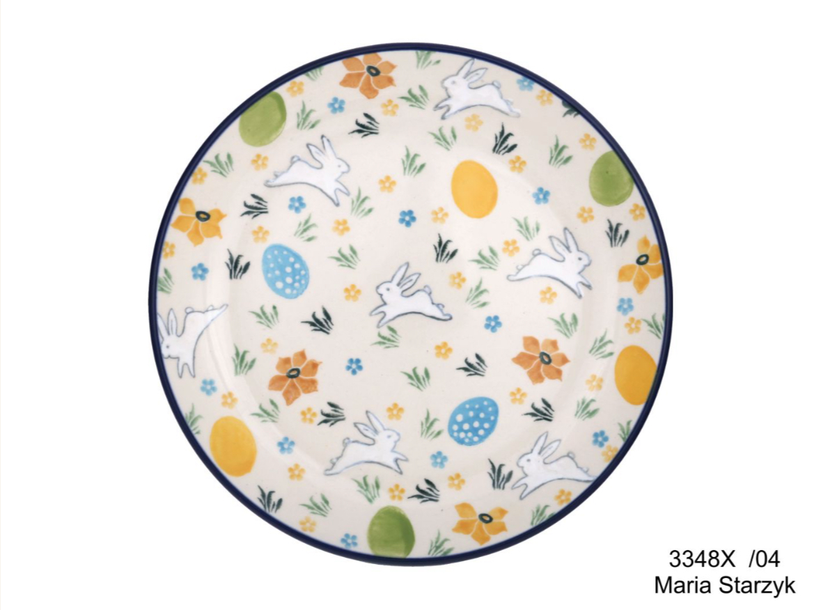 Bunzlau dessin 3348 witte springende konijntjes. Paaseieren in blauw, geel en groen